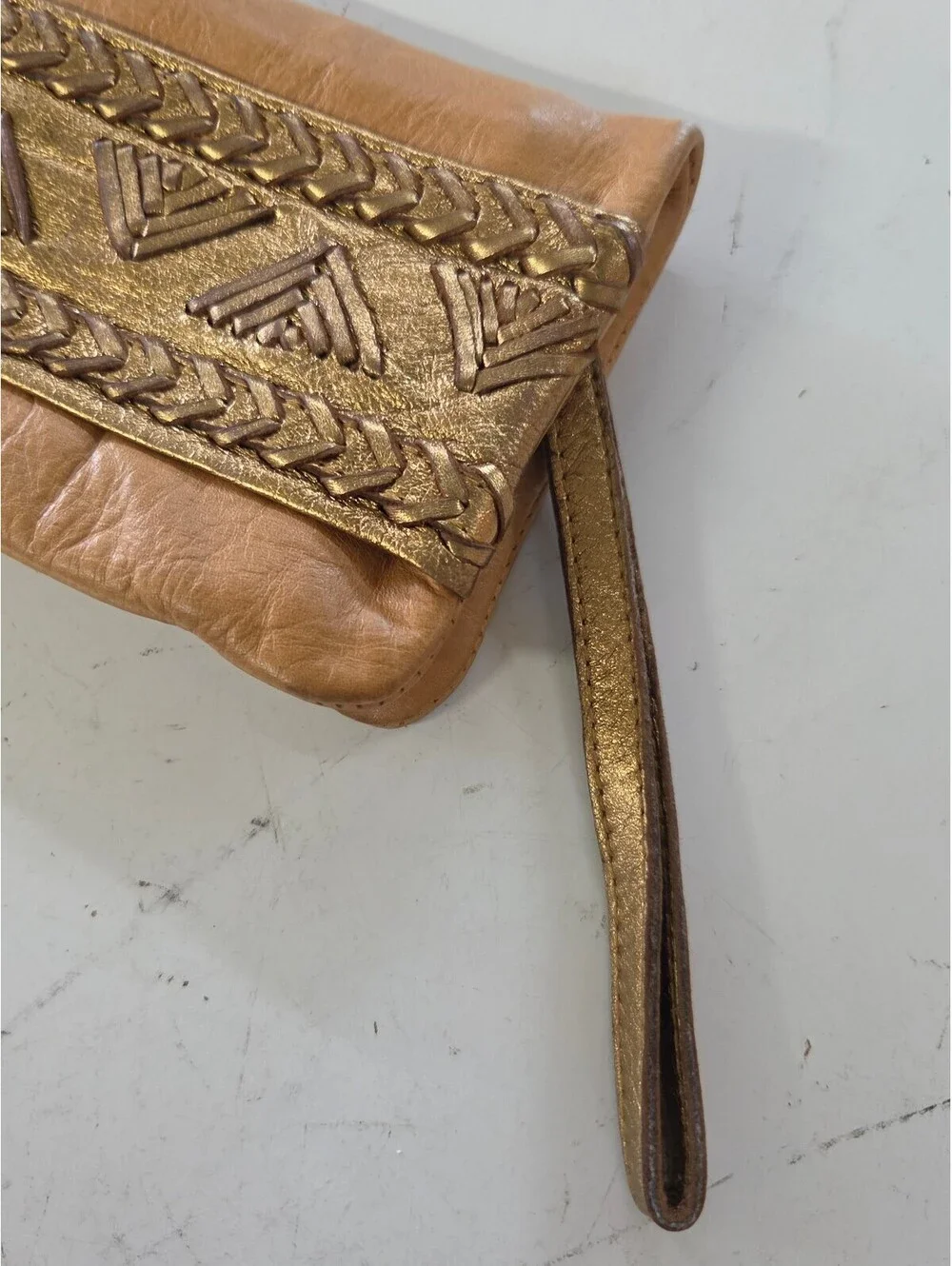 Samvara Leather Wristlet Clutch with Gold Embroidered Detail